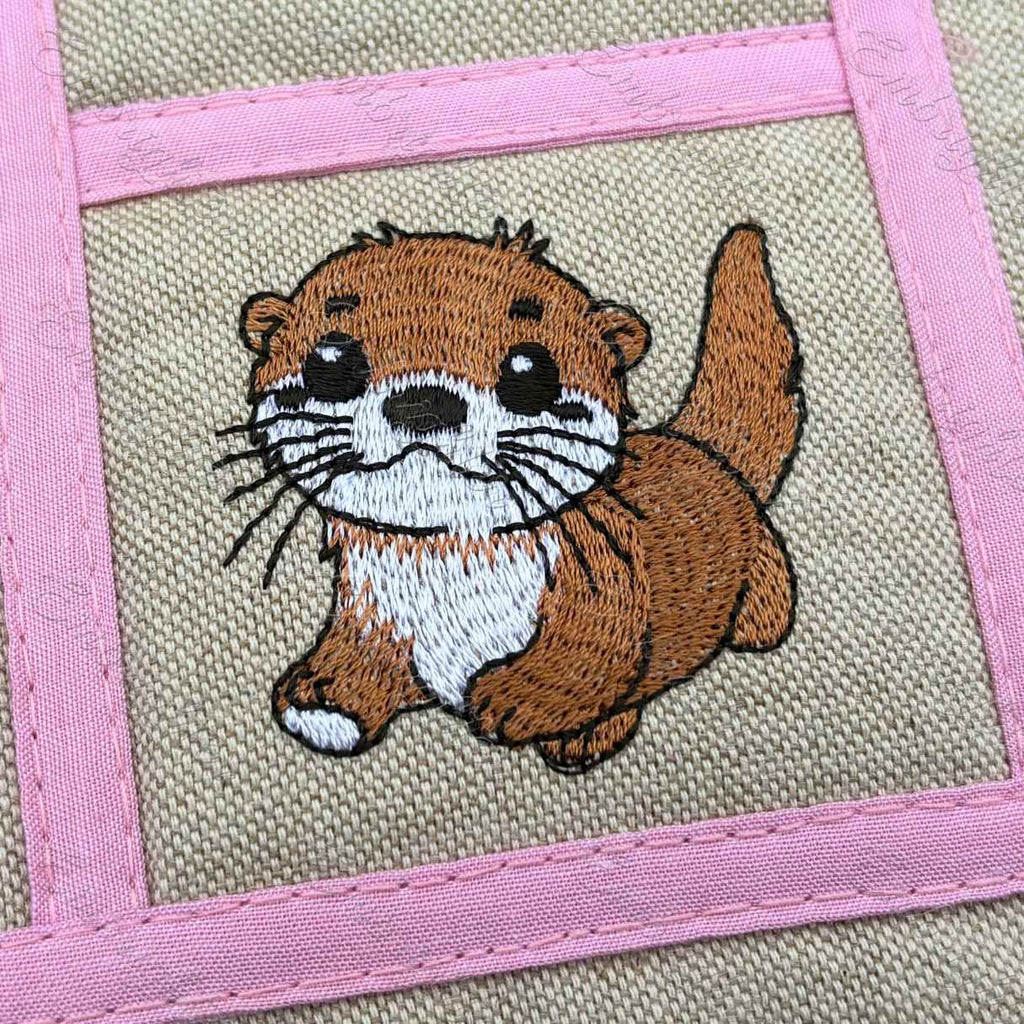 Scampering Otter embroidery design