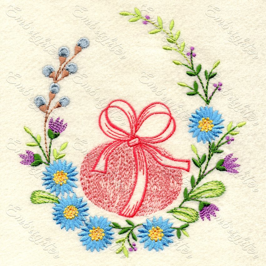 Easter egg with bow in egg shaped flower frame machine embroidery design