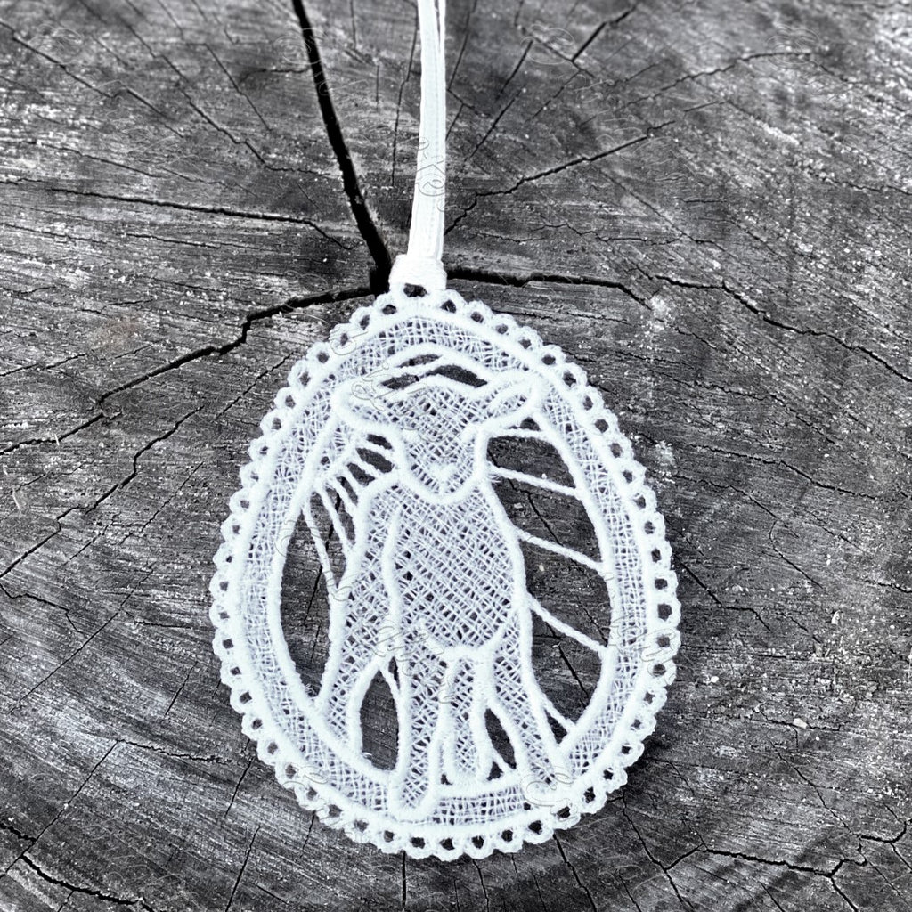 Egg shaped easter free standing lace ornament with cute lamb.