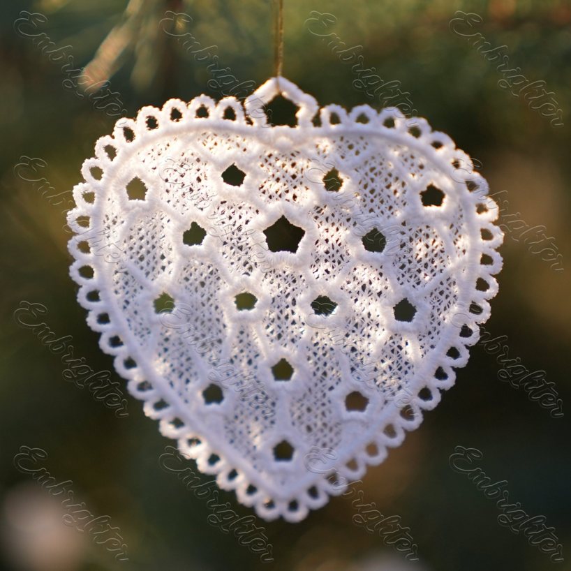Free standing lace christmas heart ornament machine embroidery design. 