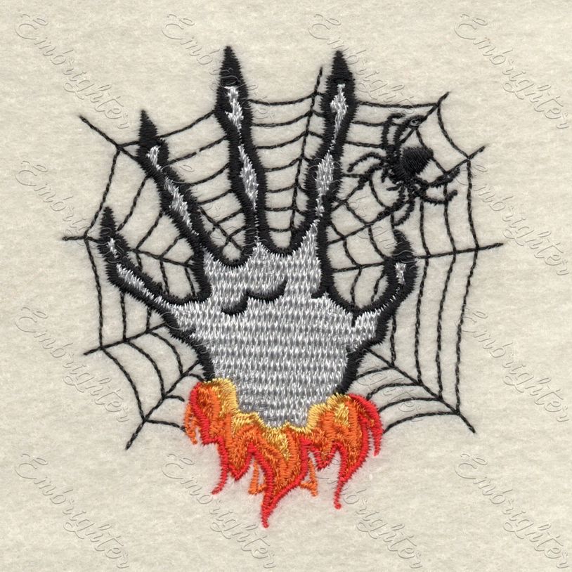 Machine embroidery design. Scary halloween pattern. Witch hand with spider web.