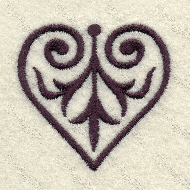 Machine embroidery design. Beautiful heart with tendrils. 