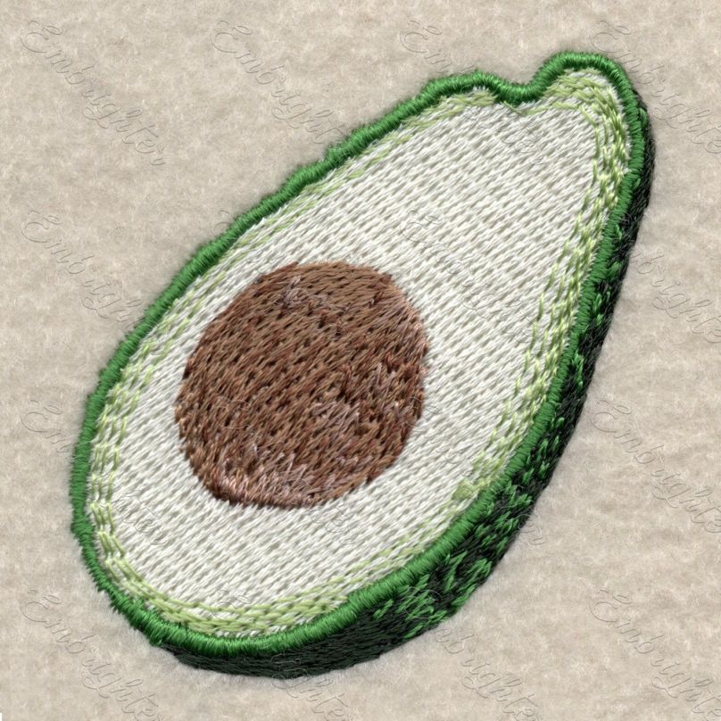 Machine embroidery design. Real looking, half cutted avocado pattern.