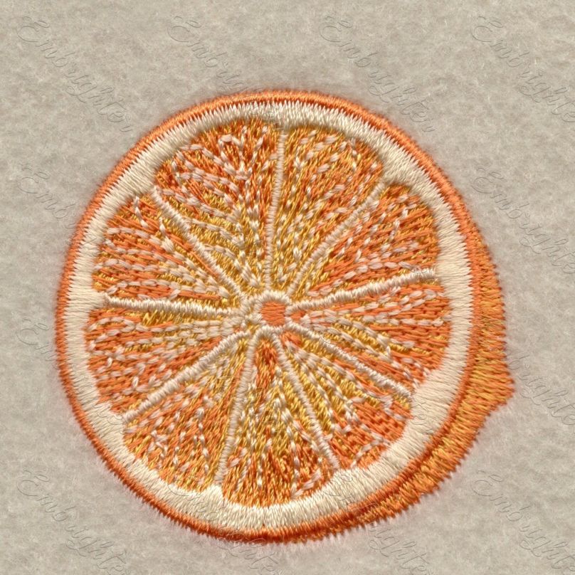 Machine embroidery design. Real looking, half cutted lemon pattern.