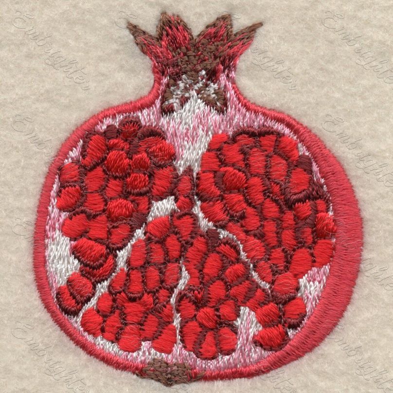 Machine embroidery design. Real looking, half cutted pomegranate pattern. 