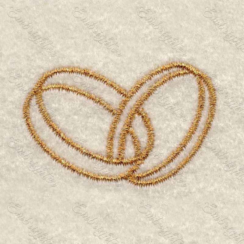 Two intertwined wedding rings machine embroidery design. Can be used on ring pillows or as wedding decorations.