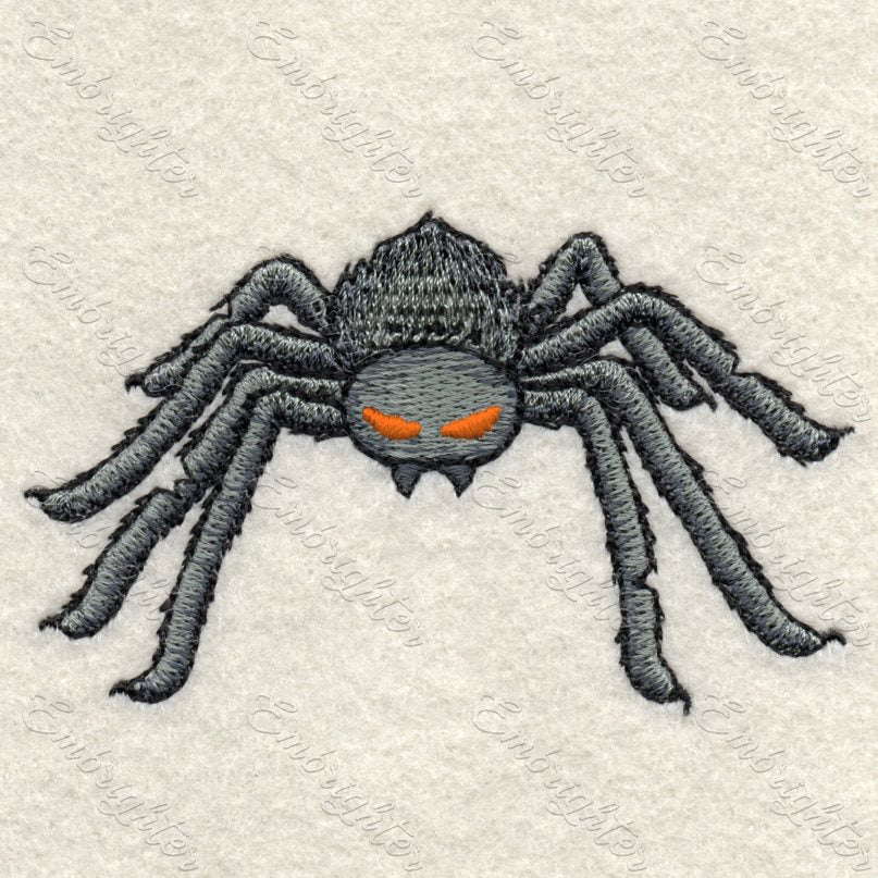 Scary zombie spider Halloween machine embroidery design. Grey zombie spider with scary orange eyes. 